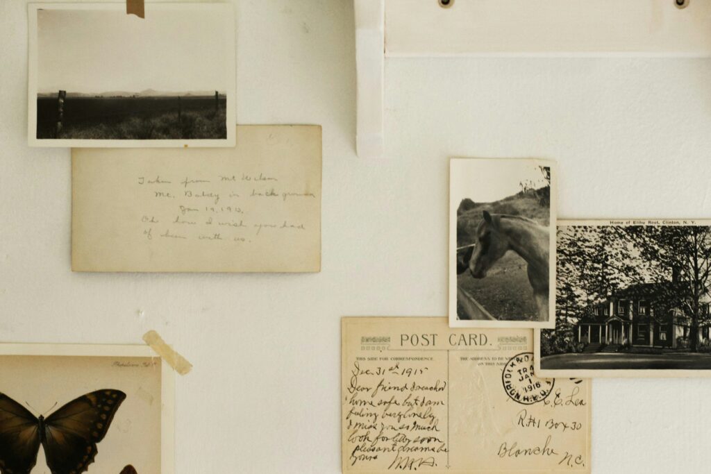postcards tacked on wall
