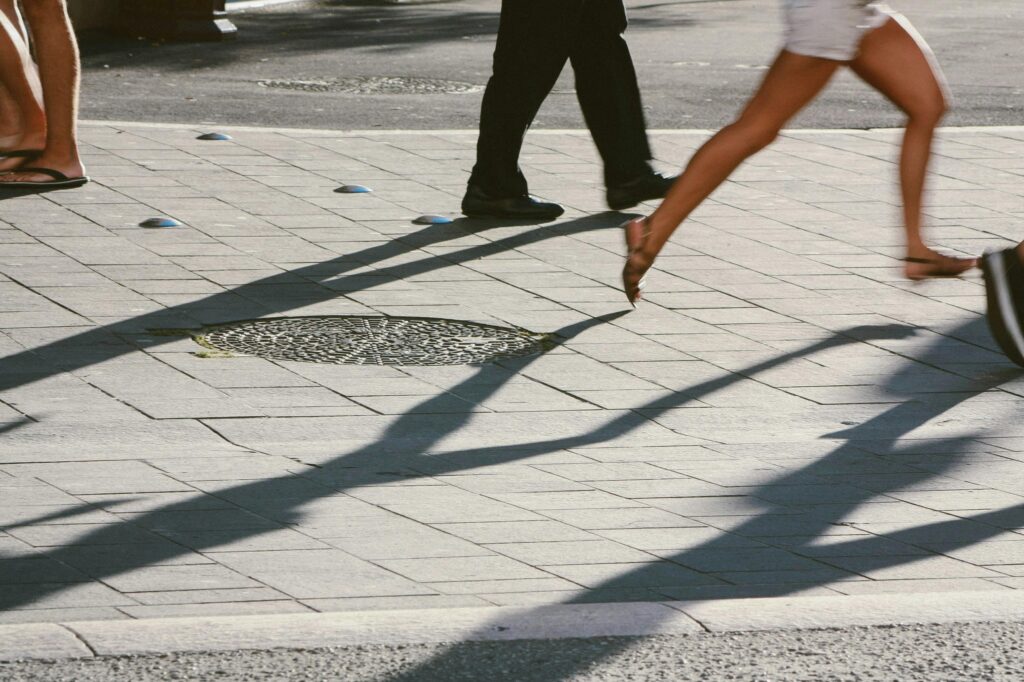 legs running on a city street