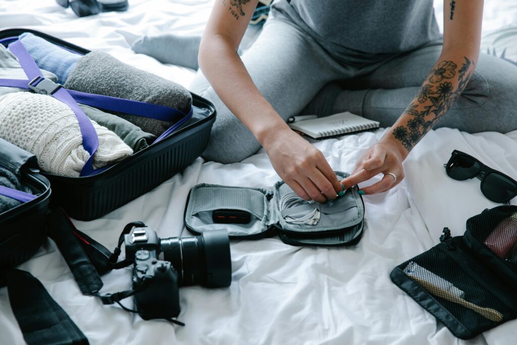 woman packing a camera